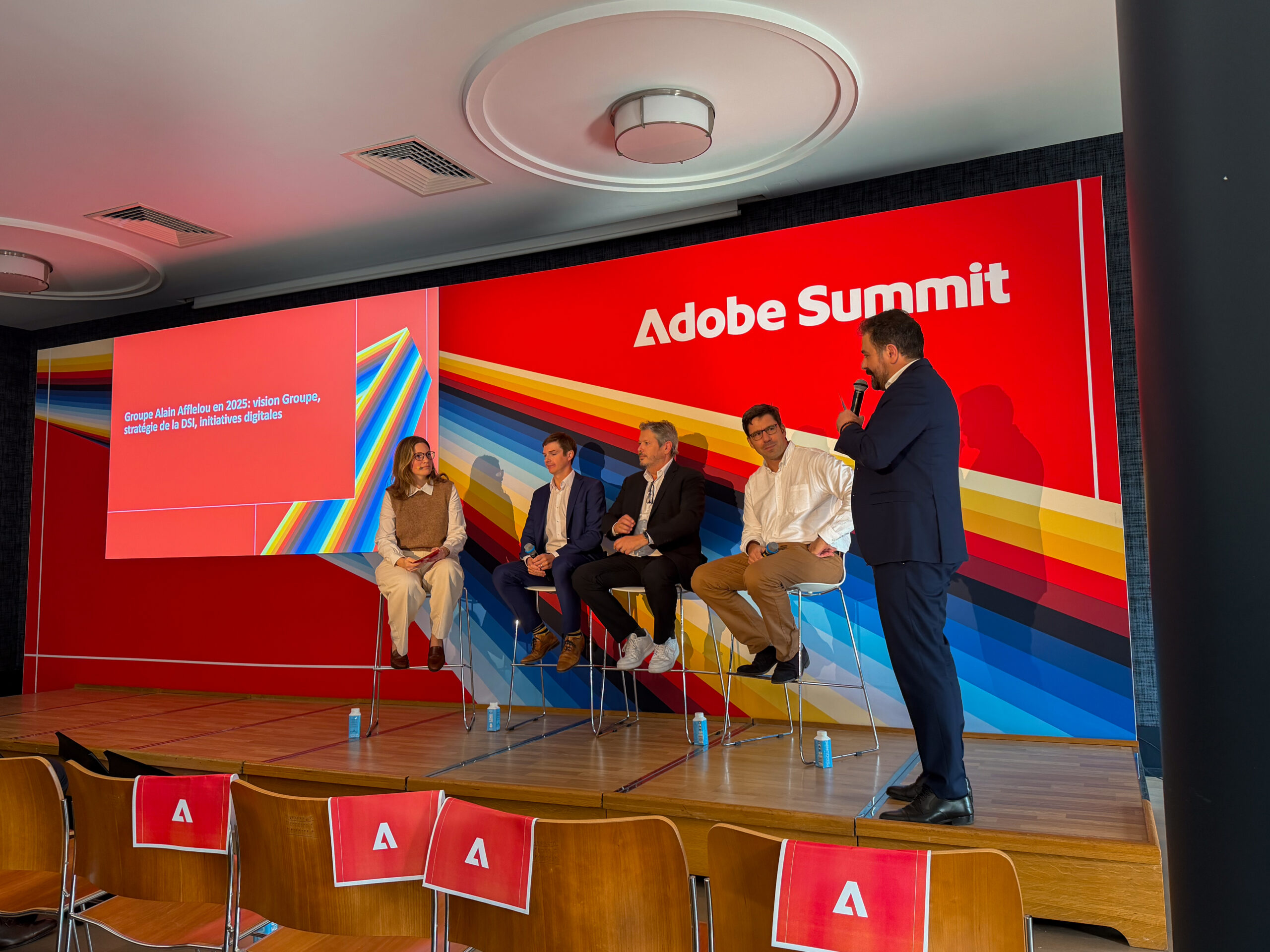 Photo de la conférence des équipes Adobe et ATI4 à l'Adobe Summit 2025.
